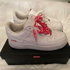 Supreme White Sneakers with Red Logo Laces